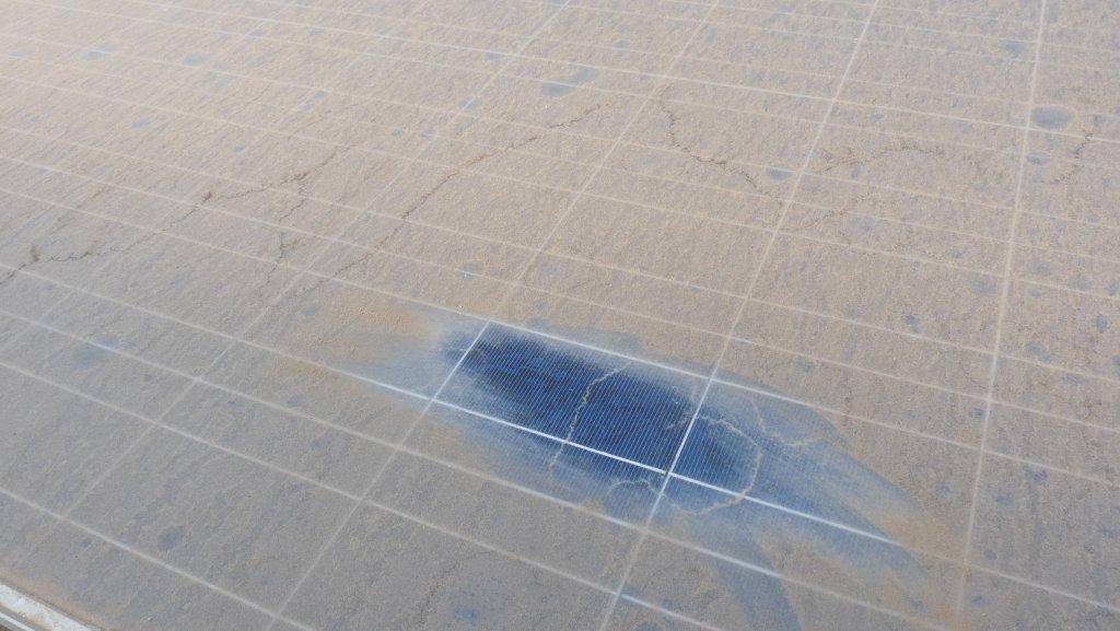 Side-by-side image showing water spots vs clean panel